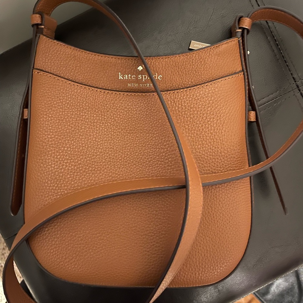 Kate Spade cross body.  Almost brand new.  Only carried once.